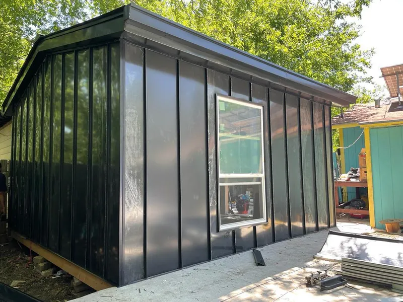 Black standing seam metal wall panels for Metal Roof Installation in Whitefish Bay