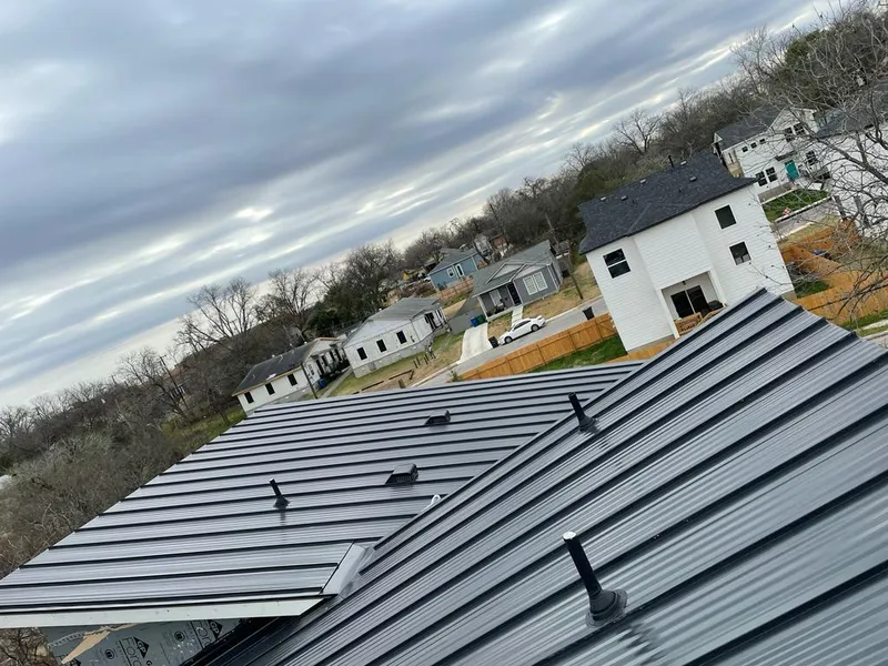 Standing seam metal roof panels with vents for Skylight Repair in Whitefish Bay